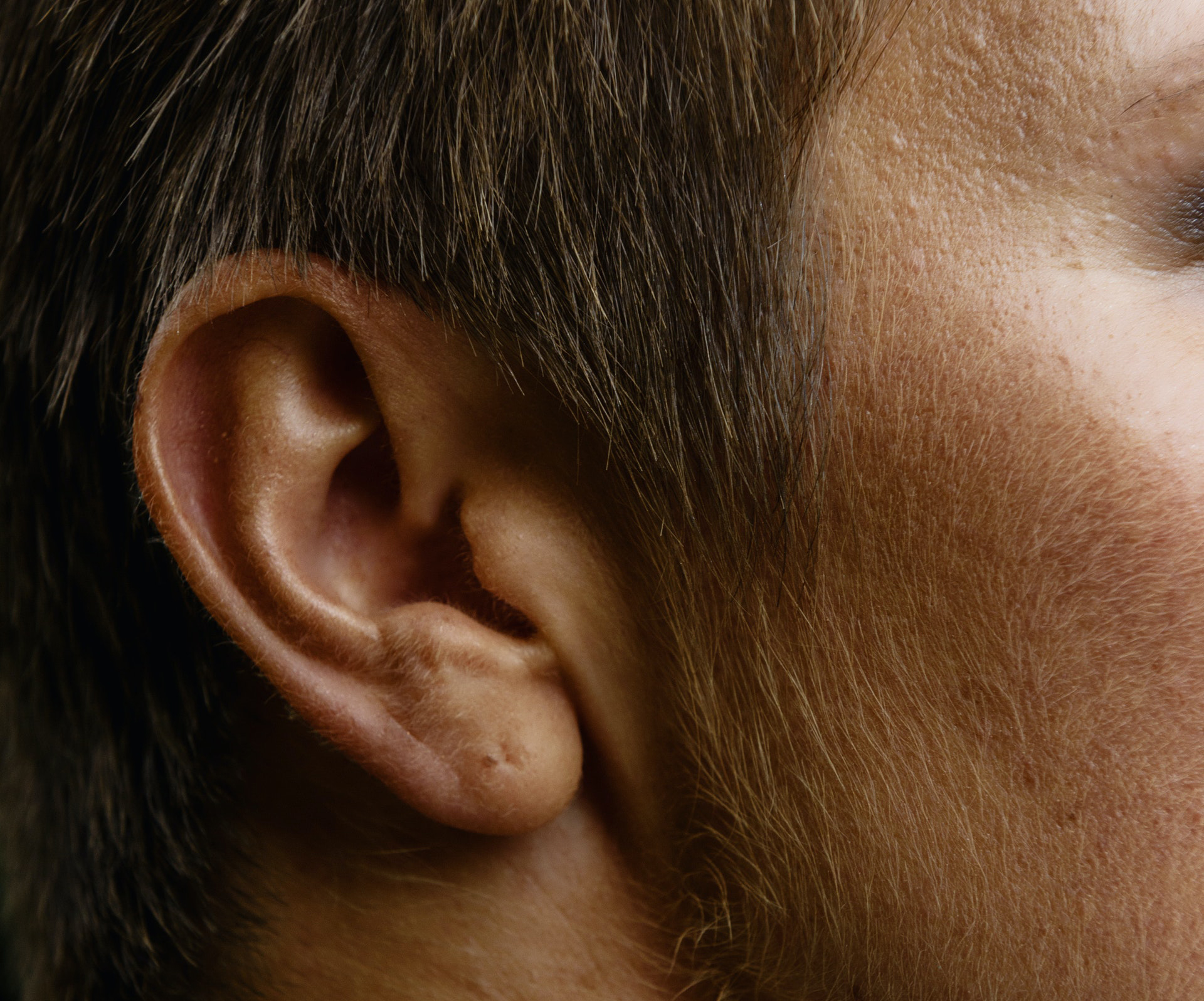 close up of a man's ear